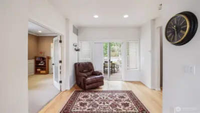 This lower-level space offers a seamless transition to the outdoor patio—perfect for entertaining