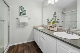 Primary Bath with double vanity and walk-in shower.