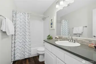 Hallway Bathroom with tub