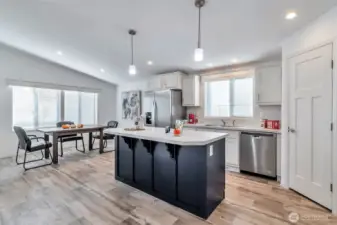 Dining area roomy enough for large table and hosting holiday gatherings, or small groups and extra help for the Chefs in the kitchen.