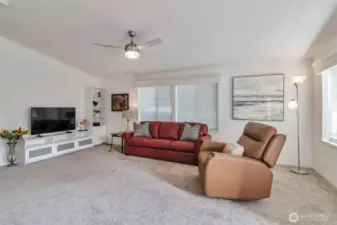 Open concept living area, lots of natural light and room for guests and family to enjoy gatherings or games!