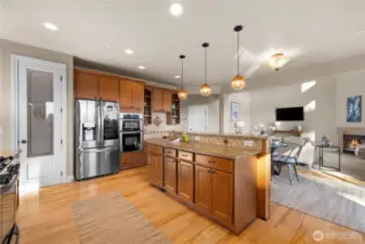 Stainless steel appliances and walk in pantry.