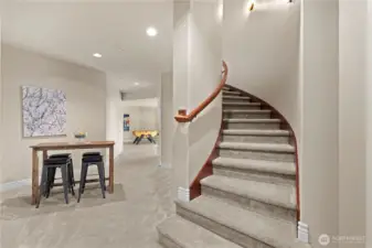 Staircase off the main hall to the lower level.