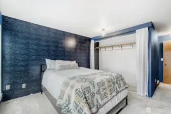 Primary bedroom bathed in natural light.