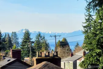 The Olympics on a sunny day from inside the condo.