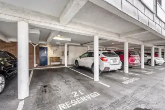Reserved parking for unit 303 is right near the back entrance to the lobby