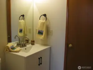 Half bath / Utility room conveniently located off the Family Room.