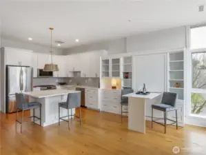 Looking back at kitchen and built in's from the balcony door.