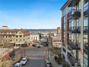 View of the unit deck on the north side of the building.  You can enjoy the Cascade Mountains on a clear day and  surrounding skyline both night and day.