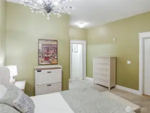 Staged: Another view of the Primary suite w/walk-in closet and full bath.