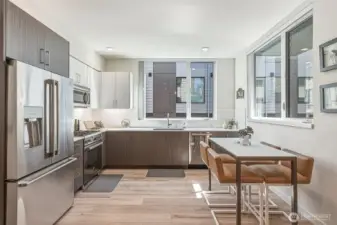 Spacious kitchen with room for dining table.