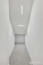 Under stairs storage is well-lighted and extra spacious (access thru closets)