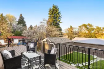 Enjoy eating, entertaining, and relaxing from the enlarged back deck that overlooks the large lot & greenbelt