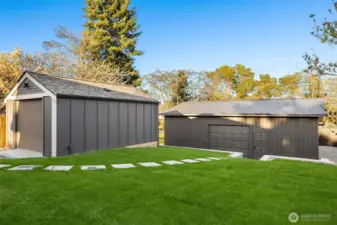 Outback you will be welcomed by a large lot and two detached structures