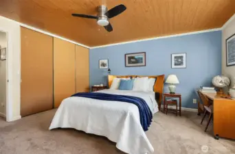 Bedroom featuring large closet offering room for storage and functionality.