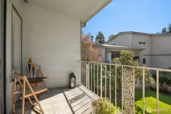Expansive deck provides plenty of space for outdoor seating and entertaining.