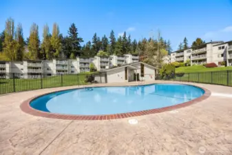 Central gated pool area, perfect for relaxing or entertaining.