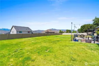 Nice fenced large backyard with stamped cement patio with Beautiful Views