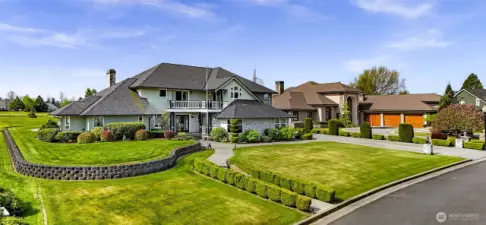 Home has substantial curb appeal with an immaculately manicured front lawn