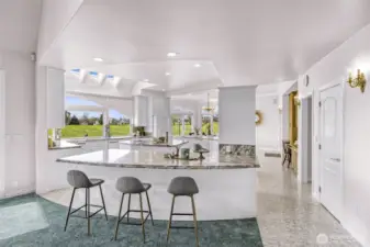 The large and open Kitchen is found at the center of the home