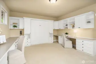 Built in murphy bed with closets and 2 desks make this the ultimate flex space.