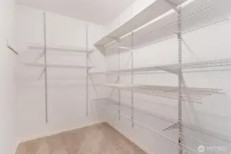 Primary walk-in closet.