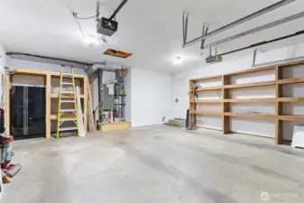 Finished garage with storage space.