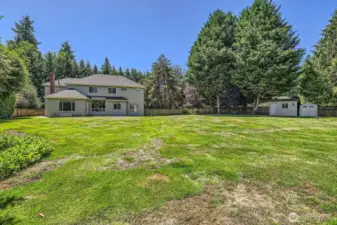 Another look toward the back of the house.  New grass seed was just planted and should fill in those bare areas soon.