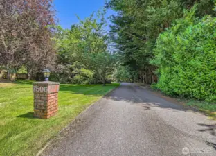 Enter this home down a private lane, completely hidden from the street.