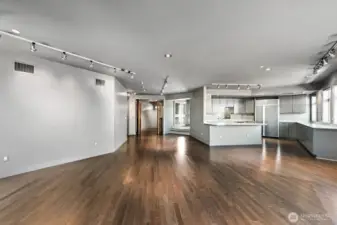 Yes. The living and dining room space is this large. Beautiful Mirage wood floors laid on diagnol for more drama.