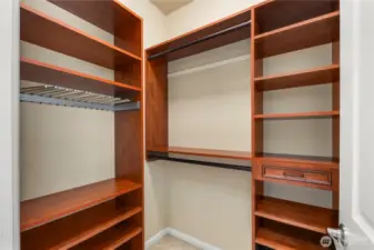 Primary walk in closet, his and hers