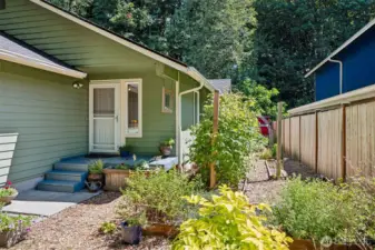 For the garden enthusist, this space is a dream-complete with raised beds and trellises. It's the perfect spot to grow your own fruits and vegetables.