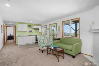 Lower level space features 2 bedrooms along with a kitchen area and a full length deck to enjoy the views.