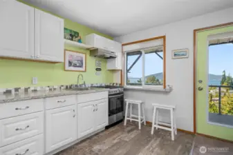 The lower level has it's own access from the side of the home.