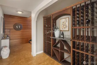 Wine "cellar" wall. For those looking for an enclosed, temperature-controlled wine room, this could be the ideal spot adding a glass wall and metal racks...