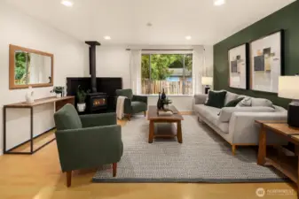 Spacious living room with large windows.