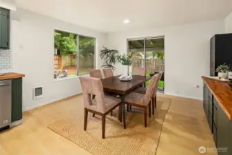 Dining room with sliding glass doors leading to back patio.