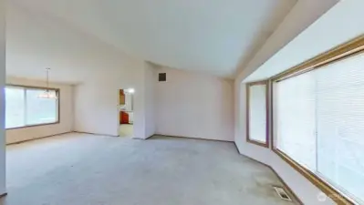 Living room with dining room to the left