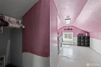 A small pocket closet for bedroom number three right when you enter the room.