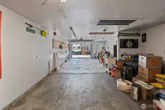 The interior of the four car garage is fully finished with heat and electricity.