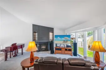 Main Floor Living Room showcasing Fireplacele &Windows