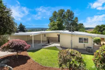 Welcome home to the Highlands mid-century gem!