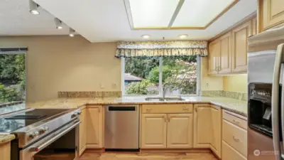Fully updated kitchen with gorgeous countertops and stainless appliances.