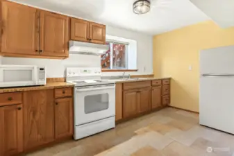 Lower level kitchen with eating space