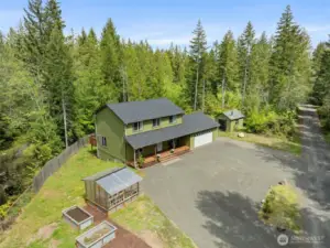 Ariel view of property with large driveway area