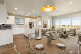 Living/kitchen, staged photo of a different unit but the same Cypress model for reference only.