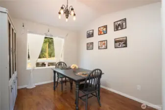 The formal dining room is adjacent to  the kitchen & living room.