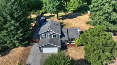This half acre lot offers lots of space and privacy. The back of the property abuts a green belt for added seclusion.