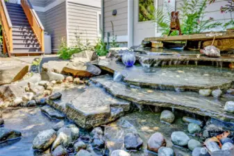 Water feature behind the garage.