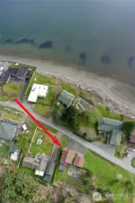 Overhead view of the home and surrounding yard.